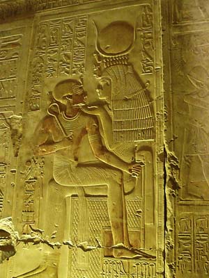 Relief of Ihy sitting on Hathor's lap, at Abydos